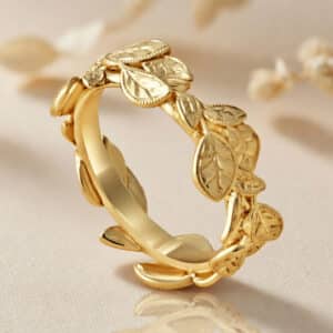 14k yellow gold hand engraved vine leaves wedding ring vintage style engraved band milgrain detail orospot