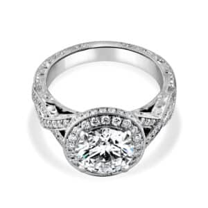 vintage hand engraved platinum ring featuring a 2ct round lab diamond, antique double halo, filigree gallery, and braided hand carved shank.