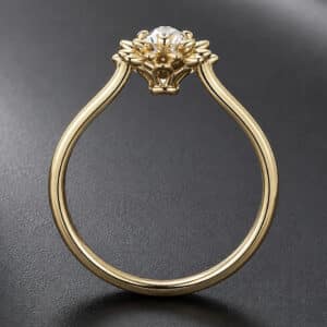 Side profile of a sunflower-inspired diamond ring with textured petals and a polished gold band.