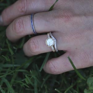Blue sapphire channe hand engraved band