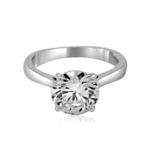 Minimalist solitaire engagement ring with round lab-grown diamond in a classic prong setting.