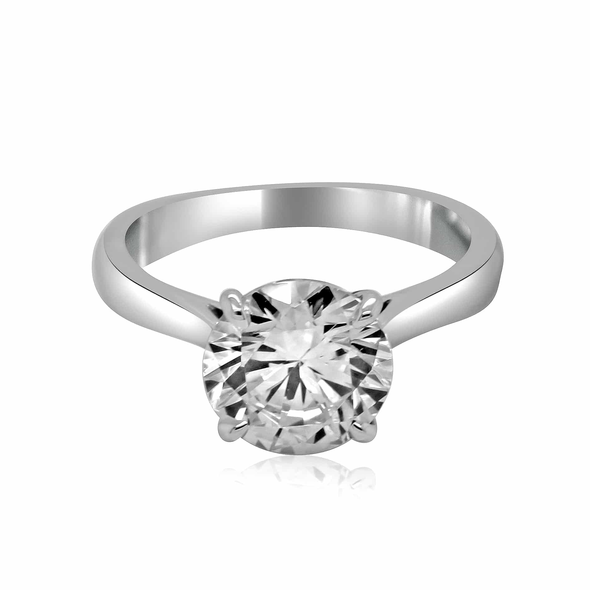 Minimalist solitaire engagement ring with round lab-grown diamond in a classic prong setting.