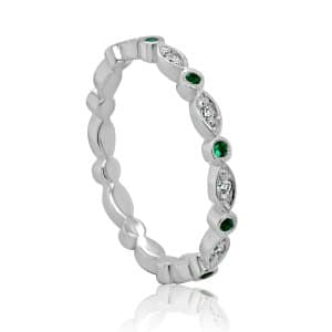 Delicate gemstone and diamonds wedding band