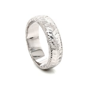 domed vintage engraved men's wedding rin