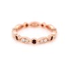 Modern Diamond and garnet eternity ring