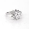 Modern diamond halo moissanite ring
