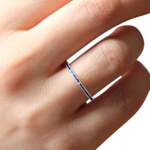 Stackable blue sapphire channel band 1.3mm