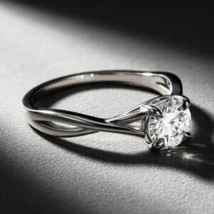 Braided engagement ring featuring a round lab-grown diamond center stone and polished band by OroSpot.