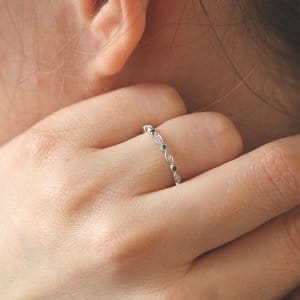 contemporary diamond green emerald pave stack band