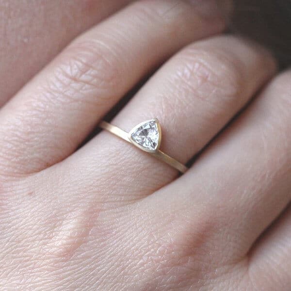 contemporary trillion moissanite engagement ring