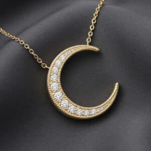 Diamond crescent moon pendant in solid gold with celestial-inspired design by OroSpot.