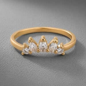 Diamond curved ring enhancer in 14K yellow gold featuring three pear-shaped lab diamonds and two round lab diamonds in a chevron contour design.