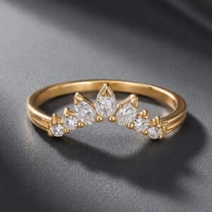 14K yellow gold curved nesting wedding band with lab-grown diamonds, satin finish, and contoured profile.