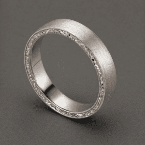 Flat engraved matte men’s wedding band with hand-engraved sides and milgrain detail, handmade by OroSpot