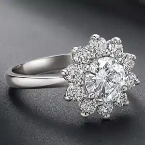 Floral halo engagement ring featuring a round certified lab-grown diamond and natural accent diamonds.
