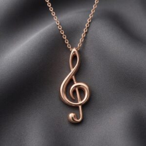 14K gold treble clef pendant necklace for musicians by OroSpot.