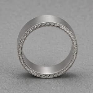 hand engraved wheat pattern mens wedding band close up milgrain detail vintage gold ring orospot