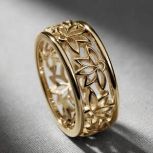 14K yellow gold lotus flower eternity wedding band with detailed Buddhist-inspired filigree pattern handcrafted by OroSpot.