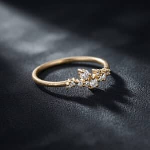 14K gold petite engagement ring featuring a cluster of eleven natural diamonds in a classic prong setting.