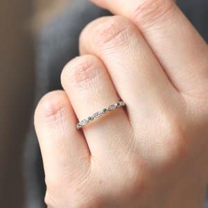 skinny delicate diamonds with geen emeralds stackable band