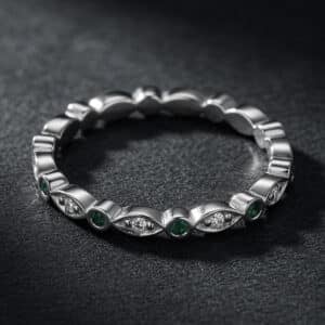 skinny stackable diamond green emerald band