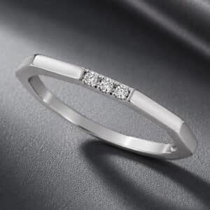 Thin decagon diamond band in 14K white gold featuring a geometric profile and delicate diamond accents.