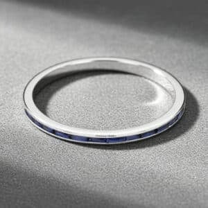 thin sapphire eternity ring french cut blue sapphires platinum band milgrain orospot