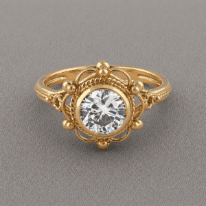 Victorian bezel set diamond engagement ring with 1.25ct lab diamond, open filigree design, and twisted antique style in yellow gold by OroSpot