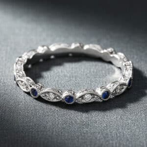 vintage engraved diamond sapphire band bezel pave diamonds milgrain orospot