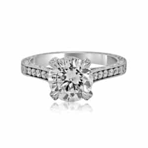 Hand-engraved diamond engagement ring with vintage detailing and milgrain edges in 14K white gold or platinum.
