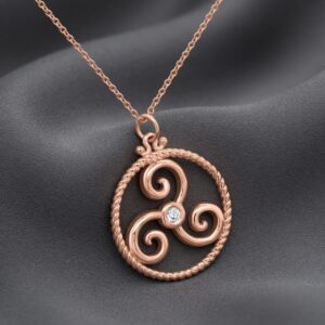 Diamond Triskelion symbol pendant necklace in solid gold by OroSpot.