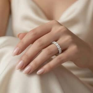 14K white gold eternity band with approximately 4.5ct total weight of lab-grown diamonds.