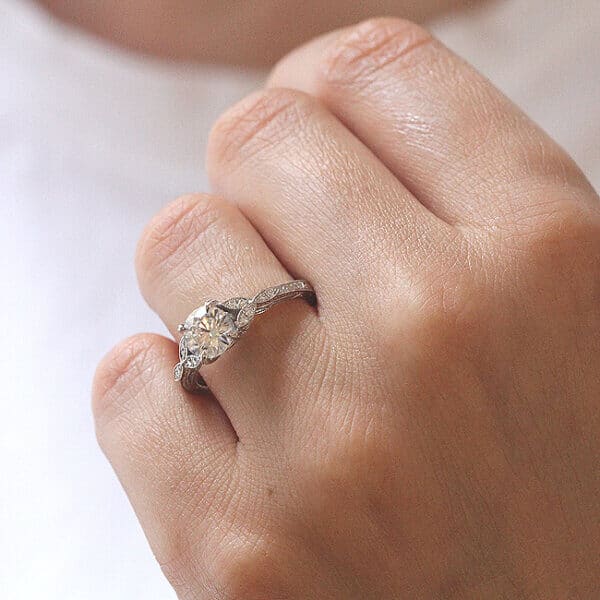 Engraved Floral engagement ring with forever one moissanite in gold by OroSpot