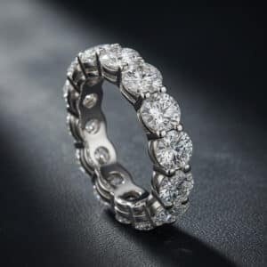 14K white gold eternity band with approximately 4.5ct lab-grown diamonds in a shared-prong setting.