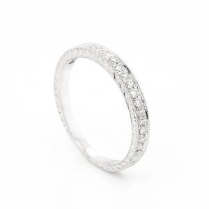 Hand-carved-diamond-pave-wedding-ring-by-OroSpot