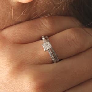 Scroll engraved petite budget engagement ring with princess Moissanite by OroSpot