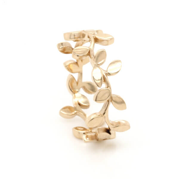 Unique wedding band with organic leaf design in solid gold by OroSpot