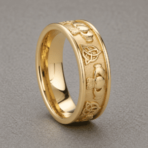 Claddagh Irish men’s wedding ring in gold with hands heart and crown design and sandblasted background by OroSpot