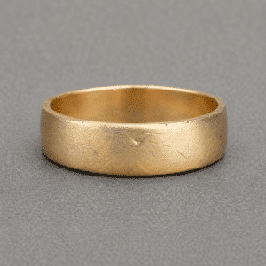 Textured men’s wedding band with raw matte finish in solid gold minimalist design by OroSpot