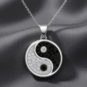 Diamond Yin Yang pendant in solid 14K gold with black and white diamonds by OroSpot.