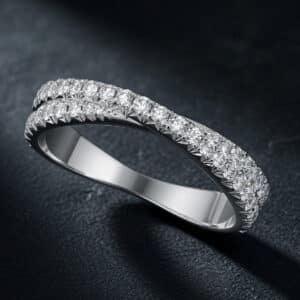 Modern overlapping diamond wedding band with French cut-down diamond setting and a comfortable low-profile design.
