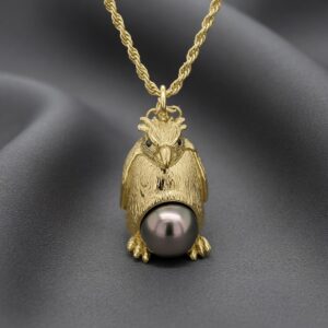 14K gold penguin pendant necklace with black Tahitian pearl by OroSpot.