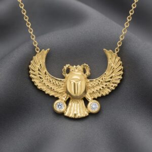 Scarab Khepri gold pendant with bezel-set diamonds inspired by ancient Egyptian symbolism by OroSpot.