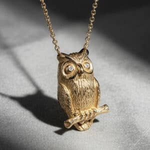 Diamond owl pendant in gold with symbolic wisdom-inspired design by OroSpot.