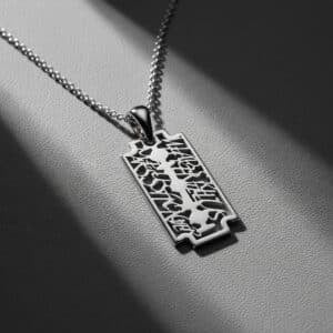 Solid 14K gold razor blade pendant necklace with philosophical symbolism by OroSpot.
