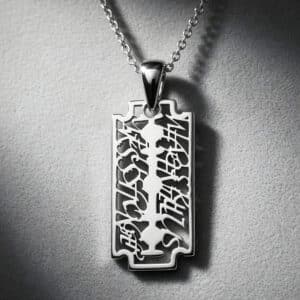 14K gold razor blade pendant necklace inspired by Nietzsche quote and symbolic resilience by OroSpot.