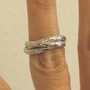 Triple rolling ring in platinum by OroSpot
