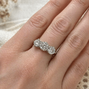 3 stone engagement ring with lab grown diamonds, hand engraved band, vintage edwardian design, detailed side profile orospot