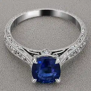 antique cushion cut blue sapphire engagement ring 1.51ct natural sapphire peekaboo diamonds hand engraved milgrain 14k white gold orospot