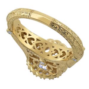 Custom-made antique-style halo diamond engagement ring with hand engraving, milgrain edges, and pavé diamond accents in 14K gold